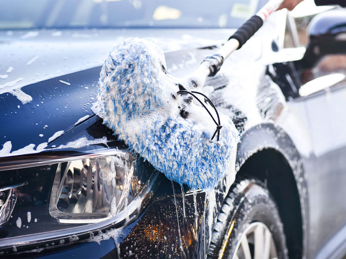 Brush Cover bei der Autowäsche in der SB-Waschbox